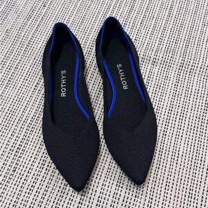 Rothy's Elegant Black Flats with Blue Trim